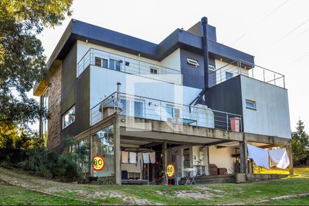 Área Externa de casa de condomínio à venda com 5 quartos, 490m² em Teresópolis, Porto Alegre