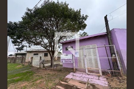Plaquinha fachada de casa para alugar com 1 quarto, 24m² em Scharlau, São Leopoldo