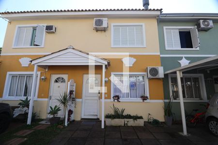 Fachada da Casa de casa de condomínio à venda com 2 quartos, 80m² em Marechal Rondon, Canoas
