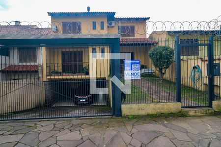 Fachada de casa à venda com 3 quartos, 287m² em Tristeza, Porto Alegre