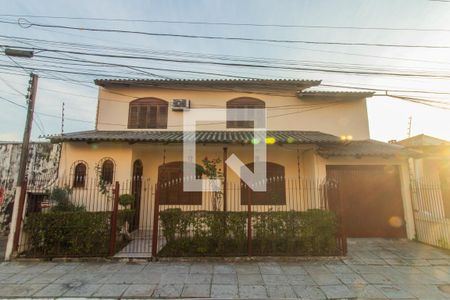 Fachada de casa de condomínio à venda com 6 quartos, 259m² em Cristal, Porto Alegre