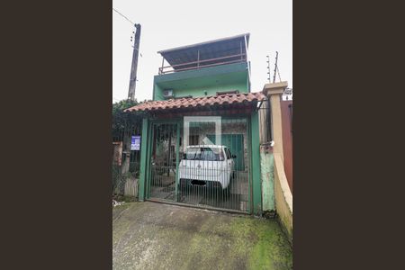 Fachada de casa à venda com 3 quartos, 140m² em Costa E Silva, Porto Alegre
