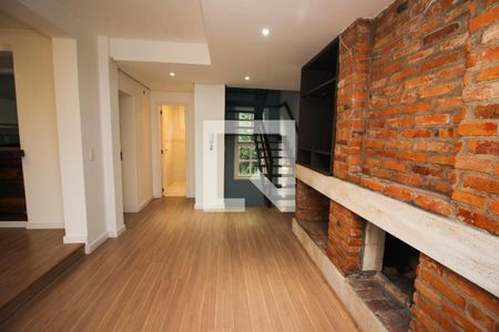 Sala 1 de casa de condomínio à venda com 3 quartos, 215m² em Jardim Isabel, Porto Alegre