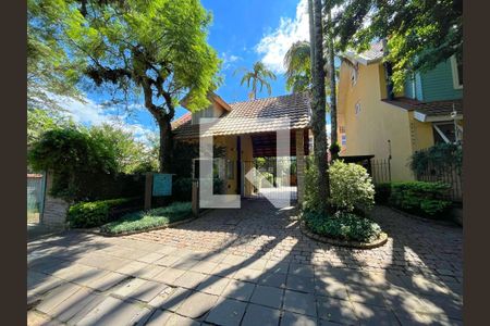 Fachada de casa de condomínio à venda com 3 quartos, 177m² em Tristeza, Porto Alegre