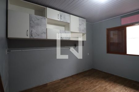 Quarto 2 de casa à venda com 3 quartos, 90m² em Harmonia, Canoas