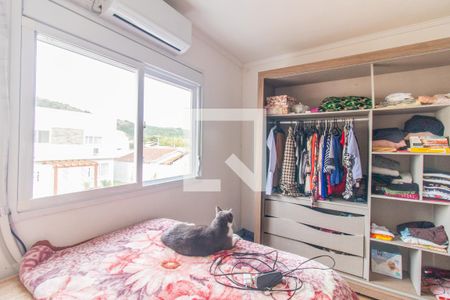 Quarto 1 de casa de condomínio para alugar com 2 quartos, 87m² em Vila Nova, Porto Alegre