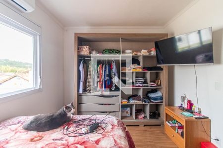 Quarto 1 de casa de condomínio para alugar com 2 quartos, 87m² em Vila Nova, Porto Alegre