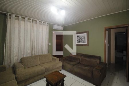 Sala de casa à venda com 3 quartos, 129m² em Rubem Berta, Porto Alegre