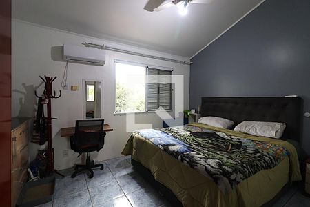 Quarto 1 suíte de casa à venda com 3 quartos, 110m² em Humaitá, Porto Alegre