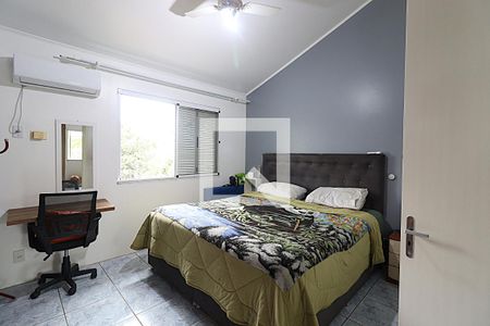 Quarto 1 suíte de casa à venda com 3 quartos, 110m² em Humaitá, Porto Alegre