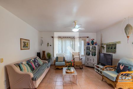 Sala de casa de condomínio à venda com 4 quartos, 131m² em Cavalhada, Porto Alegre