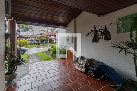 Garagem de casa de condomínio à venda com 3 quartos, 126m² em Vila Nova, Porto Alegre