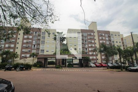 Fachada do condomínio de apartamento à venda com 2 quartos, 58m² em Vila Nova, Porto Alegre