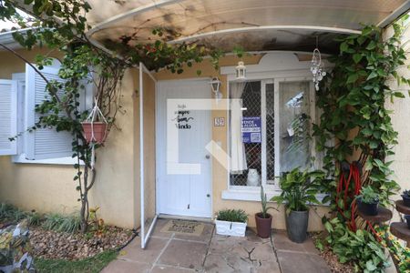Fachada da casa de casa de condomínio à venda com 3 quartos, 81m² em Rio Branco, Canoas