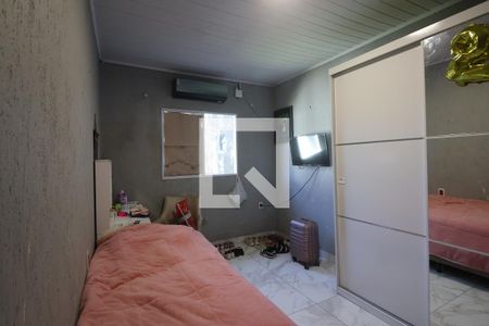 Quarto 1 de casa à venda com 3 quartos, 110m² em Mathias Velho, Canoas