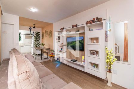 Sala de casa de condomínio à venda com 2 quartos, 56m² em Vila Nova, Porto Alegre