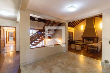 Hall de entrada de casa de condomínio à venda com 4 quartos, 504m² em Cavalhada, Porto Alegre