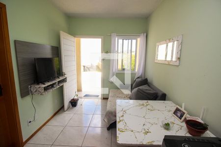 Sala de casa de condomínio à venda com 2 quartos, 50m² em Restinga, Porto Alegre