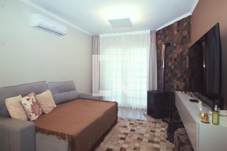 Sala de casa à venda com 4 quartos, 125m² em Cavalhada, Porto Alegre