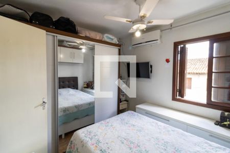 Quarto 1 de casa de condomínio à venda com 2 quartos, 70m² em Vila Nova, Porto Alegre