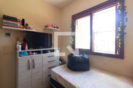 Quarto 1 de casa de condomínio à venda com 3 quartos, 148m² em Vila Nova, Porto Alegre