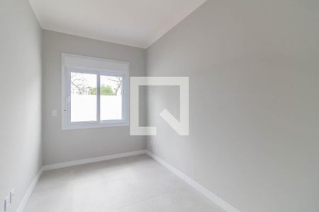 Quarto 2 de casa de condomínio à venda com 3 quartos, 96m² em Cavalhada, Porto Alegre