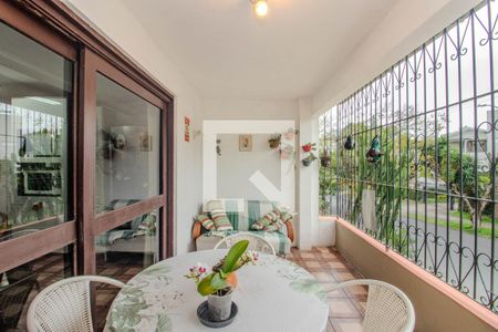Varanda da Sala Íntima de casa à venda com 5 quartos, 354m² em Três Figueiras, Porto Alegre