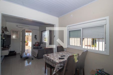 Sala de casa à venda com 4 quartos, 134m² em Vila Nova, Porto Alegre