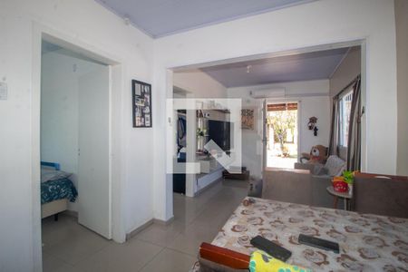 Sala de casa à venda com 4 quartos, 134m² em Vila Nova, Porto Alegre