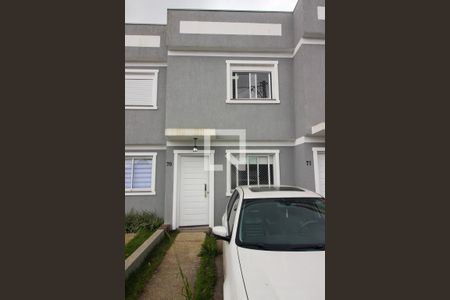 Fachada de casa de condomínio à venda com 2 quartos, 55m² em Restinga, Porto Alegre