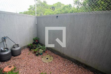 Quintal de casa de condomínio à venda com 2 quartos, 55m² em Restinga, Porto Alegre