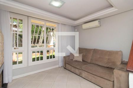 Sala de casa de condomínio à venda com 3 quartos, 140m² em Teresópolis, Porto Alegre