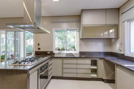 Casa à venda com 4 quartos, 421m² em Jardim Santo Amaro, São Paulo