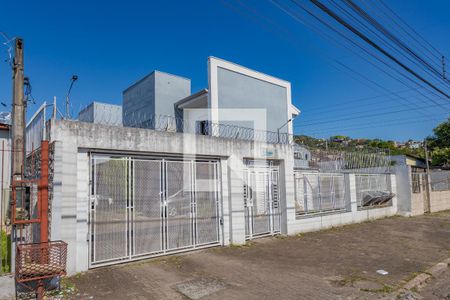 Fachada de casa de condomínio à venda com 2 quartos, 82m² em Jardim Carvalho, Porto Alegre