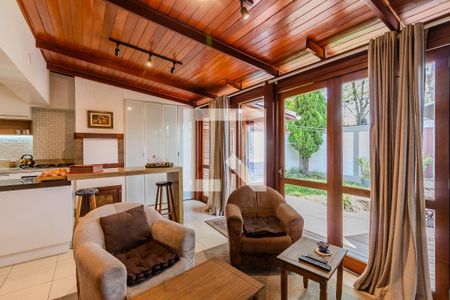 Sala de TV de casa de condomínio à venda com 3 quartos, 130m² em Cavalhada, Porto Alegre