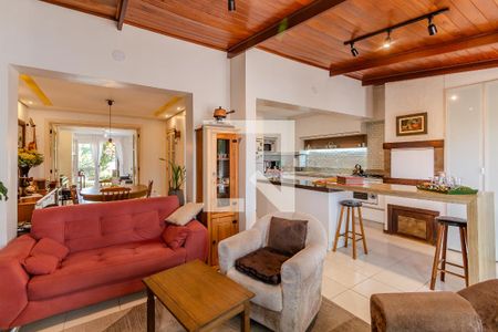 Sala de TV de casa de condomínio à venda com 3 quartos, 130m² em Cavalhada, Porto Alegre