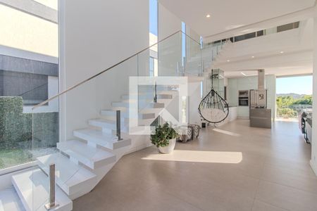 Sala de casa de condomínio à venda com 3 quartos, 309m² em Vila Nova, Porto Alegre