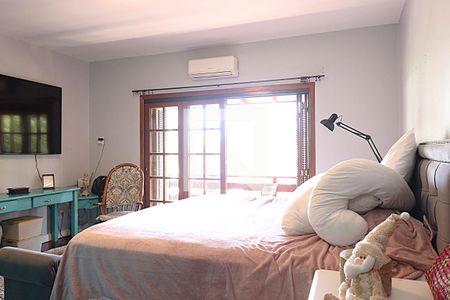 Suíte 1 de casa à venda com 4 quartos, 400m² em Vila Jardim, Porto Alegre