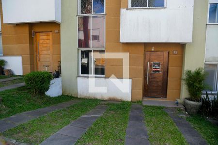 Fachada de casa de condomínio para alugar com 2 quartos, 90m² em Mário Quintana, Viamão