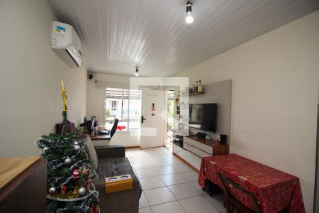 Sala de casa de condomínio à venda com 2 quartos, 55m² em Hípica, Porto Alegre
