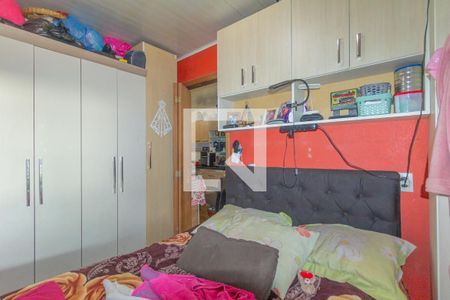 Quarto 1 de casa à venda com 3 quartos, 150m² em Guajuviras, Canoas