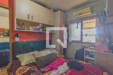 Quarto 1 de casa à venda com 3 quartos, 150m² em Guajuviras, Canoas