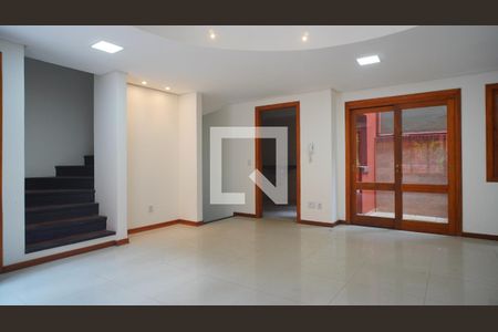 Sala  de casa de condomínio para alugar com 4 quartos, 217m² em Vila Jardim, Porto Alegre