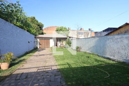 Área externa de casa à venda com 3 quartos, 100m² em  Rio Branco, Canoas