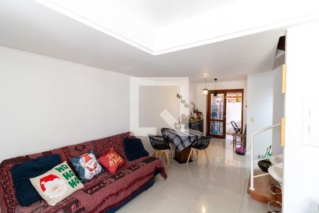 Sala de casa de condomínio à venda com 3 quartos, 99m² em Espírito Santo, Porto Alegre