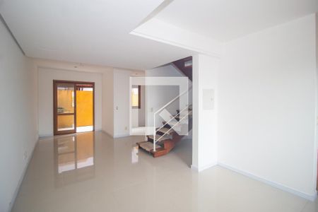 Sala de casa de condomínio à venda com 3 quartos, 99m² em Espírito Santo, Porto Alegre