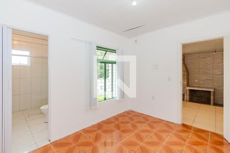 Suíte 1 de casa para alugar com 2 quartos, 90m² em Vila Nova, Porto Alegre