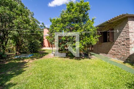 Quintal de casa à venda com 3 quartos, 100m² em Vila Nova, Porto Alegre