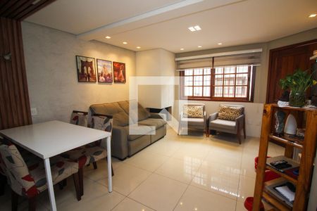 Sala de casa de condomínio à venda com 3 quartos, 129m² em Espírito Santo, Porto Alegre