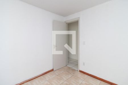 Quarto 1 de apartamento para alugar com 2 quartos, 42m² em Vila Nova, Porto Alegre